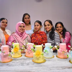Nothing makes me happier than seeing my students proudly show off their beautiful creations. This is from the finale of our celebration cake masterclass, where everyone designed and finished their own unique cake.