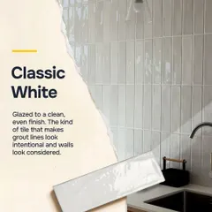 Classic white subway tiles offer a clean, glazed finish that never goes out of style. They have a way of making grout lines look intentional and walls look considered, providing a perfect canvas for any design.