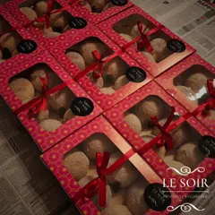 My Diwali doughnut boxes ready for delivery. Each box is filled with freshly baked, eggless doughnuts in flavours like Caramel and Intense Dark Chocolate Ganache.