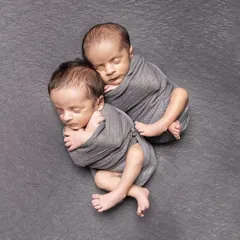 Double the joy, double the love. Watching these twins nestle together with that magical bond reminds me of the beauty and serenity that comes with new life.