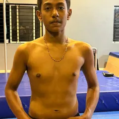 A closer look at a one year transformation. Through gymnastics and bodyweight training, this student has built a strong, athletic physique.