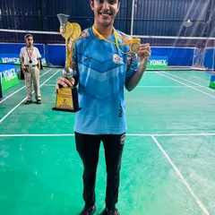 Celebrating another gold medal win at the CBSE tournament. This player's hard work in training paid off on the podium, holding her trophy and medal high.