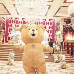 A giant, cuddly teddy bear mascot was the star of the show at this First Lohri celebration, delighting guests of all ages.