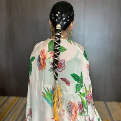 A unique Mehendi braid featuring intricate gota patti weaving and custom-made latkans with tassels for a personalized touch.