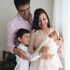 The complete family, filled with so much love for their new arrival. Capturing the pride and affection of an older sibling is one of the most heartwarming parts of my job.