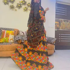 Our happy client looking absolutely stunning in our black chanya choli with vibrant multi-color embroidery, perfect for a Dandiya night.