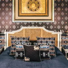 Inspired by Tibetan art and ancient rugs, I designed this series of bold cushions and an eclectic wallpaper pattern. The century-old motifs are artfully translated into luxury textiles that complement the modern aesthetic.