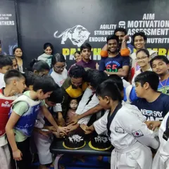 The next generation of champs cutting the cake for our club's anniversary. The energy and enthusiasm of our students is what drives us forward.