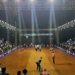 A player gets ready to bat at DPL Season 13. My setup includes perimeter branding and large LED screens in the background, which are essential for sponsor visibility and live replays during the tournament.