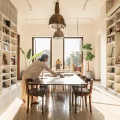 Our own studio is a living testament to our values, a space that lets us think clearly, create freely, and connect meaningfully. Natural light floods the collaborative tables, illuminating the material samples and books that fuel our research and design process.