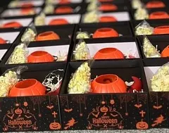 A spooky and fun Halloween order. We designed and delivered these custom trick-or-treat boxes, filled with popcorn and pumpkin-themed goodies, all within 48 hours.