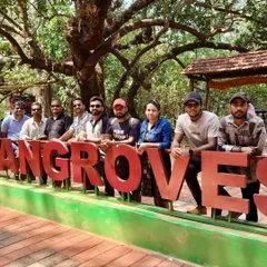 Our group at the Mangrove boardwalk in Honnavar, a serene spot we visit during our Gokarna trip.