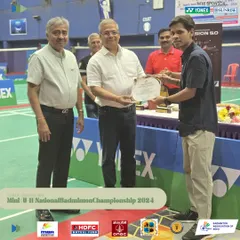 Another dedicated team member receiving a certificate of appreciation. Building a strong, motivated team is essential for consistently organizing successful, large-scale tournaments.