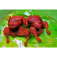 Two whole fried chickens, marinated in our signature red masala and cooked to perfection. This is a special dish we prepare for the bride and groom.