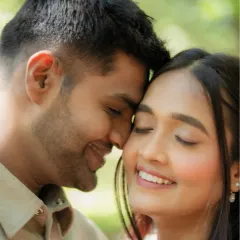 A beautiful, tight close-up of Kevin and Reeti. This shot focuses on their serene expressions and gentle connection, capturing a moment of pure, quiet love in the soft, natural light.