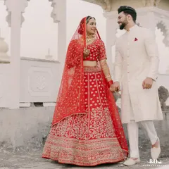 A beautiful moment from one of our grooms. His classic ivory sherwani, with its subtle texture and perfect fit, stands as a testament to timeless wedding style.