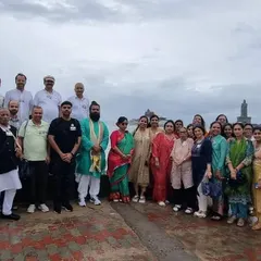 Our group at the southernmost tip of India, Kanyakumari, with the Vivekananda Rock Memorial and Thiruvalluvar Statue in the background. A moment of powerful spiritual significance.