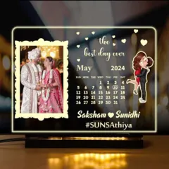Commemorate 'the best day ever' with this printed acrylic LED showpiece. It features a photo, a calendar marking the special date, names, and a custom hashtag, making it a perfect wedding or anniversary gift.