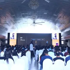 A view from the back of a packed hall at the UXINDIA summit. This shot effectively conveys the scale of the event and the high attendance, providing a powerful visual for future event promotion.