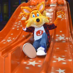 Look who's joining the fun. Our friendly mascot, J the Fox, loves to surprise the kids, sliding down and joining the party to make birthdays and events extra special.