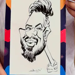 A close-up of a black and white caricature created during the Fractal25 corporate celebration. The custom branded frame makes it a perfect corporate souvenir.