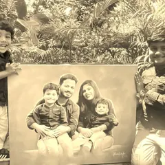 This family portrait was done in a classic, monochromatic style using acrylics, creating a timeless piece of art for the client.