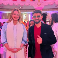 Posing with film star Sonakshi Sinha at a celebrity meet and greet. Hosting these events requires a unique skill set to keep both the celebrity and their fans engaged and comfortable.