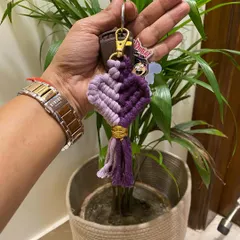 Another color combination for the macrame heart keychain, this time in two shades of purple. I can create these in any custom colors you like.