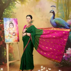 A beautiful Krishna-inspired maternity portrait. The mother-to-be stands beside a painting of baby Krishna, surrounded by peacock elements, creating a divine and colorful celebration of motherhood.