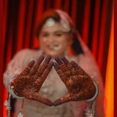 A detailed, artistic shot of the bride's beautiful henna design. Focusing on details like this preserves the memory of every element that made the day special.