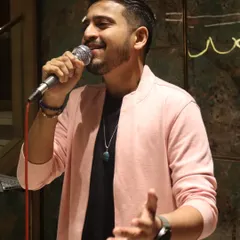 A candid moment of joy while performing at a private birthday celebration in Ghatkopar. My goal is to connect with the audience and share in their happiness through music.