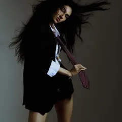 An inside spread for Hunter Magazine. This shot captures a moment of effortless cool, using a single light source to create a moody, high-fashion feel.