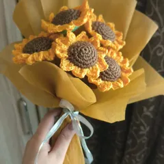 A full bouquet of our handmade crochet sunflowers. This makes a stunning and cheerful gift for birthdays or Mother's Day.
