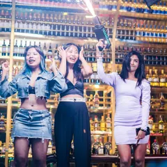 A great shot of the crowd enjoying a confetti gun blast. These moments of high-energy celebration are what make my parties at Sugar Factory unforgettable.