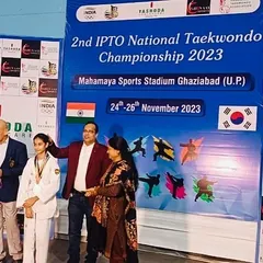 The joy of achievement. A student receives her medal at the Mahamaya Sports Stadium, representing our academy with pride and skill.