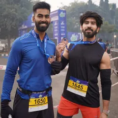 Two of our members celebrating their achievement at the Dilli 10K run. This is what our community is all about: setting goals and crushing them together.