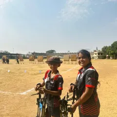 Two of our young archers at the Drona Cup. The friendships formed on the archery field are just as important as the medals won.