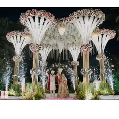 The triumphant moment after the varmala exchange, celebrated with sparklers. I plan for these picture-perfect moments, ensuring your joy is captured in the most spectacular way.