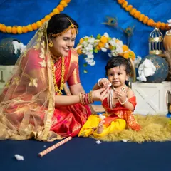 We also offer creative and traditional themes. This beautiful 'Yashoda and Krishna' setup is a wonderful way to celebrate culture and create a unique portrait of a mother and child.