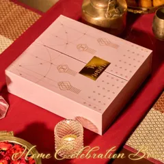 The Modern Home Celebration Box, designed with a contemporary aesthetic in soft pink. It’s filled with everything you need for a stylish and sparkling Diwali party.