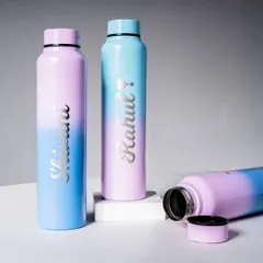 My classic dual-tone stainless steel bottles are a popular choice. This image shows the beautiful gradient effect and how a custom name can be engraved on them. They have a large 1000 ml capacity.