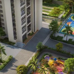 This aerial view shows a colorful basketball court and a children's play area at Sattva Lumina, demonstrating how we co-locate amenities for different age groups.