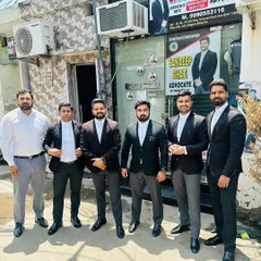 Standing with my team outside our office. We are a unit, dedicated to providing top-tier legal services and support to our clients.