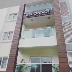 The clean facade of the 'Elegance' apartment building in Bangalore. I handle large-scale exterior painting projects, ensuring a durable and modern finish that enhances the property's curb appeal.