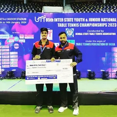 Coaching a player to national success is a proud moment. Here I am with Aakash K J after he secured two Bronze Medals at the 85th Youth and Junior National Championship, a testament to his hard work and our training program.