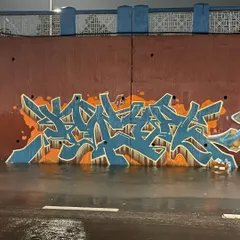 The same "KRYPT" piece as before, but this time captured at night. The wet ground reflects the colors, giving it a completely different mood.