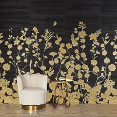 A dramatic and sophisticated wallcovering featuring golden floral silhouettes against a deep black, textured background. This "Flourish" design creates a powerful statement of opulence and artistry, perfect for an elegant entryway or feature wall.
