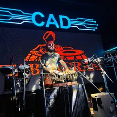 Performing live at CAD, a popular club. My setup is designed to integrate seamlessly with a club's sound and lighting system.