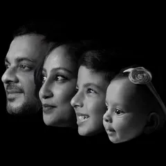 A legacy in a single frame. This artistic black and white composite portrait layers the profiles of a family, creating a powerful and modern heirloom that tells the story of generations.