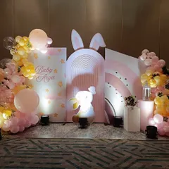 We love bringing whimsical themes to life, like this adorable bunny-themed event for Baby Arya. The setup features a custom rainbow backdrop, soft pastel balloon garlands, and a charming light-up bunny figure to create a dreamy atmosphere.